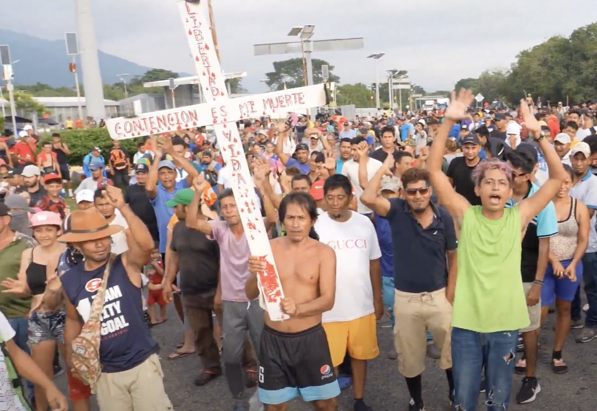 A caravan of illegal aliens chanting for Biden in Southern Mexico