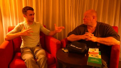A photo of Anthony Rubin interviewing Michael Yon