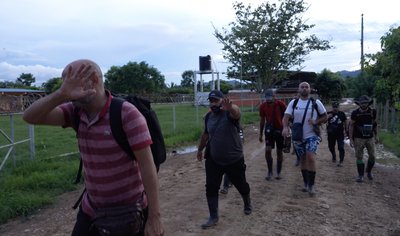 Military-aged Syrian men walking into San Vicente refugee camp in Panama