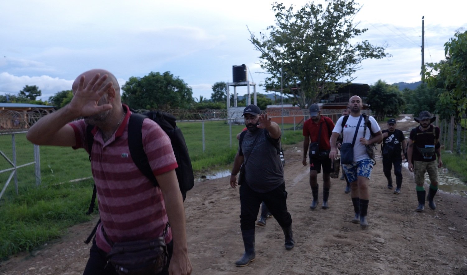 Military-aged Syrian men walking into San Vicente refugee camp in Panama
