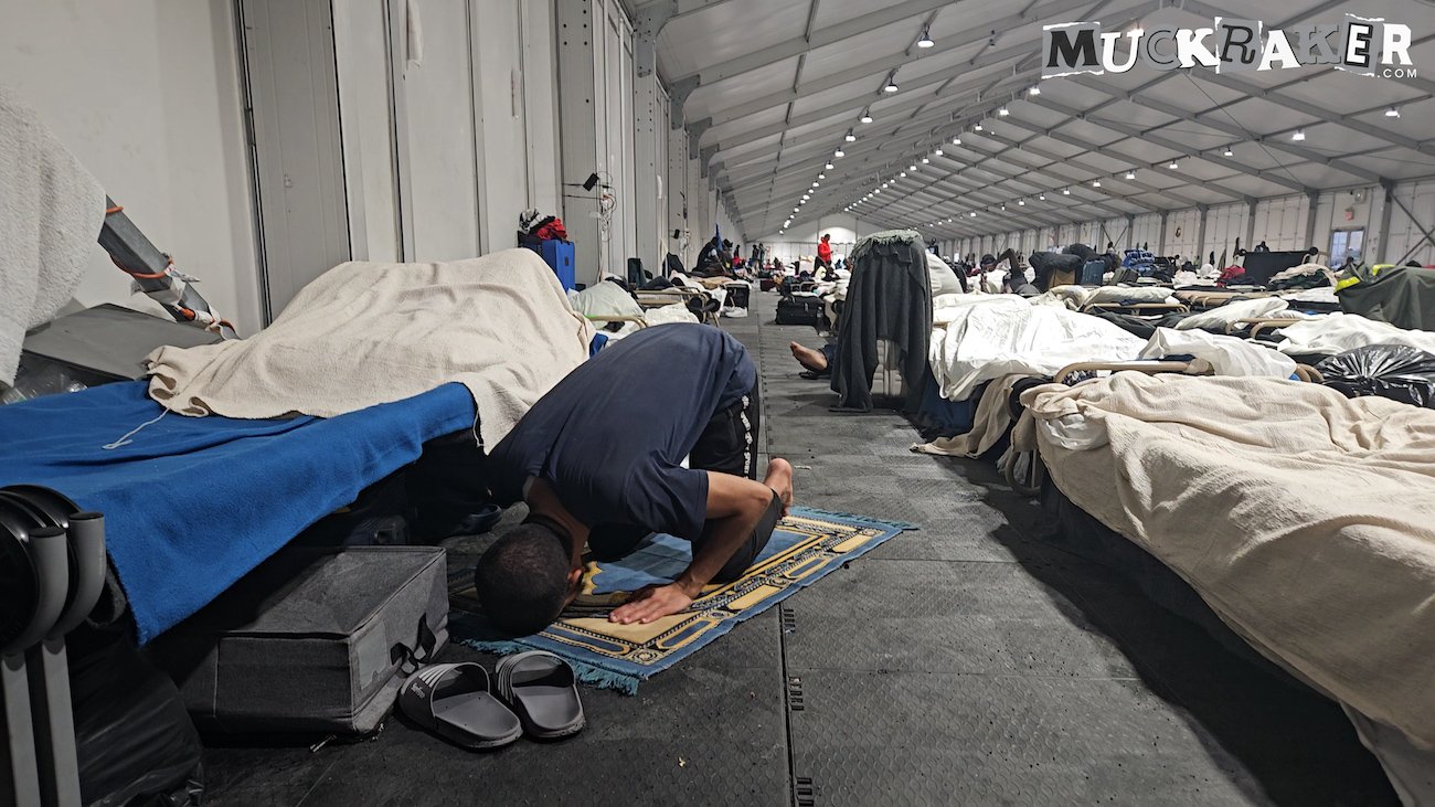 A muslim illegal alien praying at a compound on Randalls Island