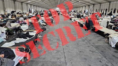 A picture of the inside of an illegal alien compound on Randalls Island with the words TOP SECRET photoshopped on top