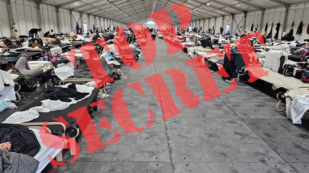 A picture of the inside of an illegal alien compound on Randalls Island with the words TOP SECRET photoshopped on top