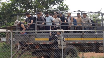 A truckload full of men who just crossed the Darién Gap in Panama
